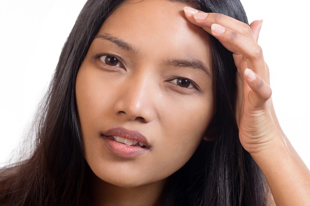 woman worrying about spots