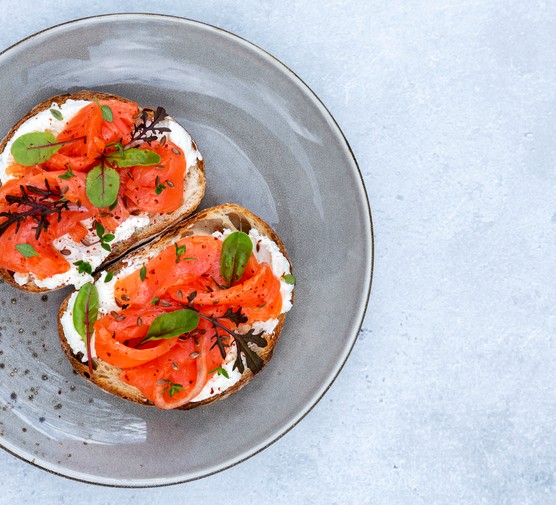 Sandwiches with cream cheese and smoked salmon smoked salmon with cream cheese on an open sandwich