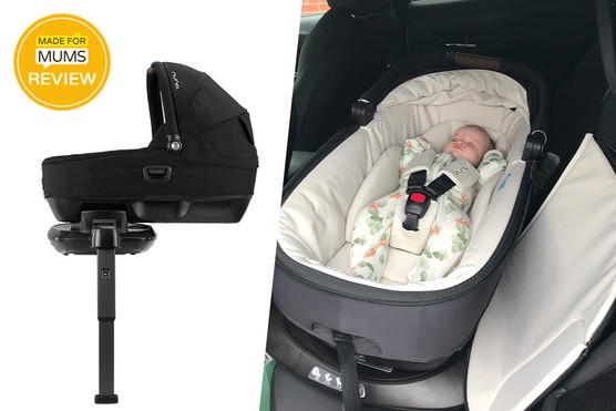 Nuna Cari Next Hero Image with product shot and baby in car seat Nuna Cari Next Hero Image with product shot and baby in car seat