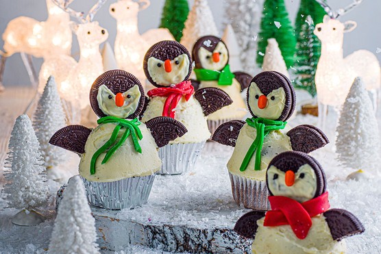 Annabel Karmel's Chilly Penguin Cupcakes in a snowy scene
