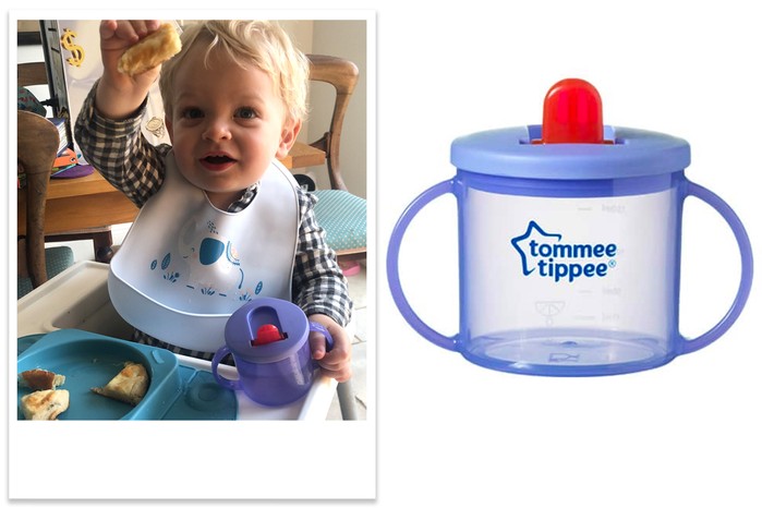 Tommee Tippee Free Flow First Cup being tested by a toddler
