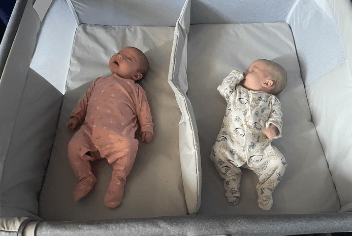 2 babies asleep in Chicco Next2Me Twin crib 2 babies asleep in Chicco Next2Me Twin crib