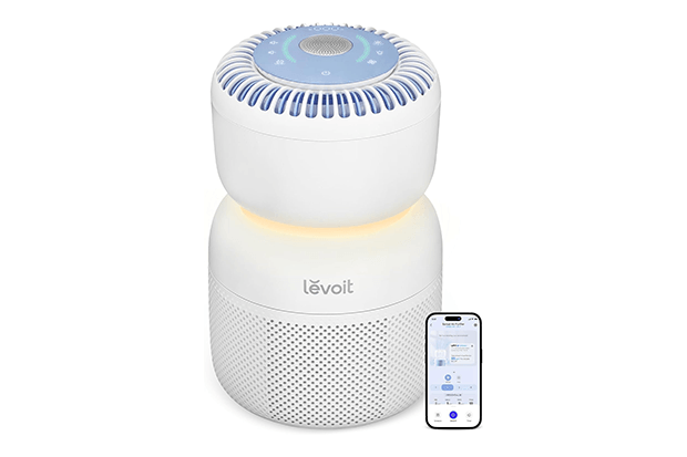levoit sprout air purifier product overview shot with phone showing app levoit sprout air purifier product overview shot with phone showing app